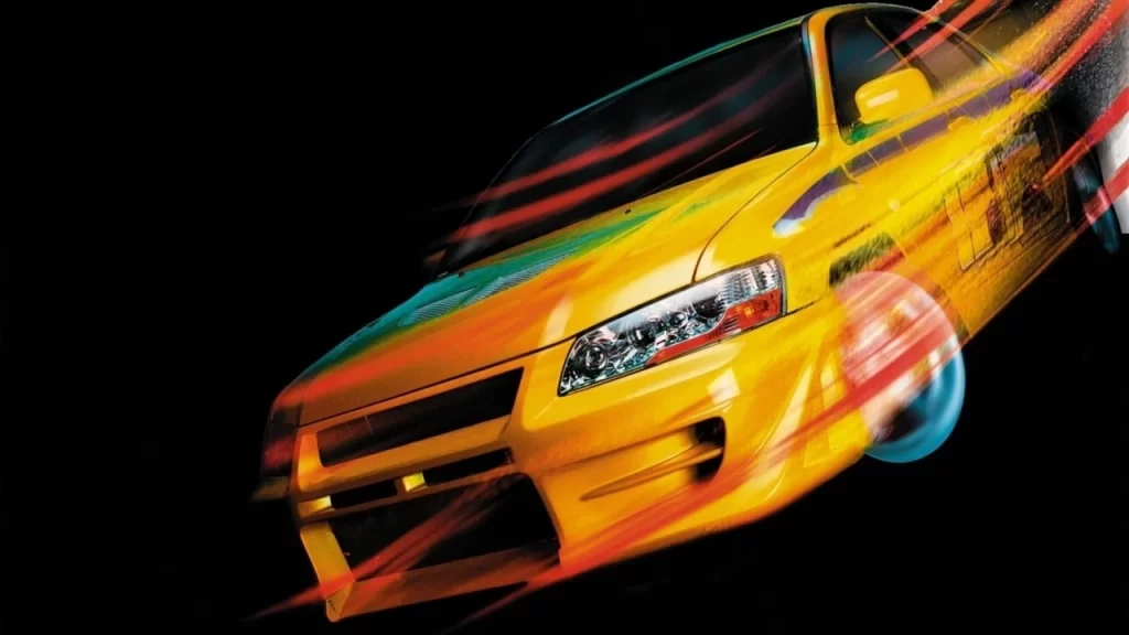 Yellow sports car with red and blue motion blur on a black background, creating a sense of speed and movement.