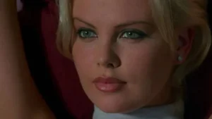 Close-up of a woman with striking features.