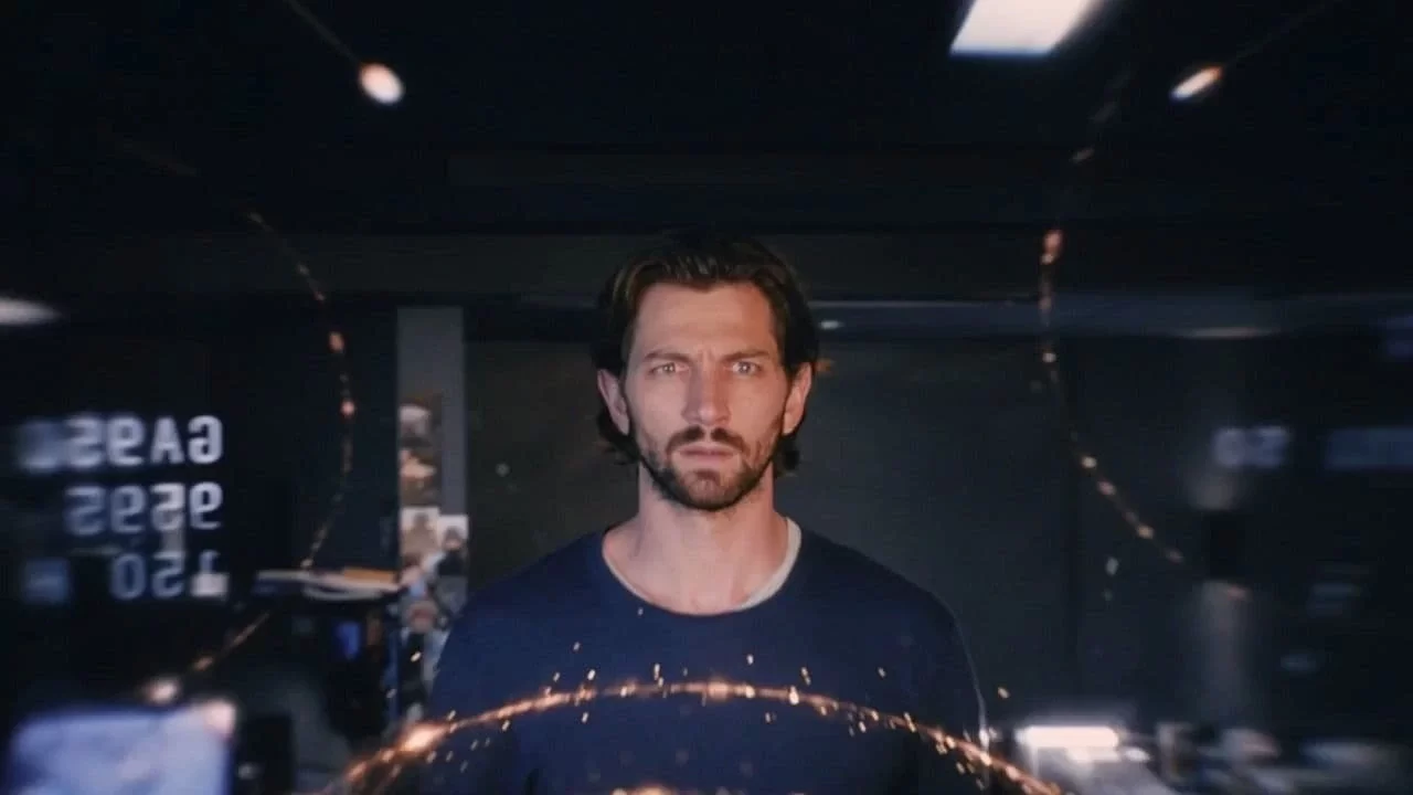 A man with a serious expression stands in a dimly lit room, surrounded by glowing lines and digital effects.